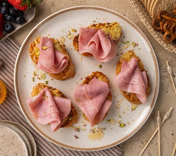 Bocaditos gratinado con jamón de espalda